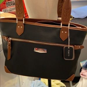 Rosetti black trimmed in brown purse.